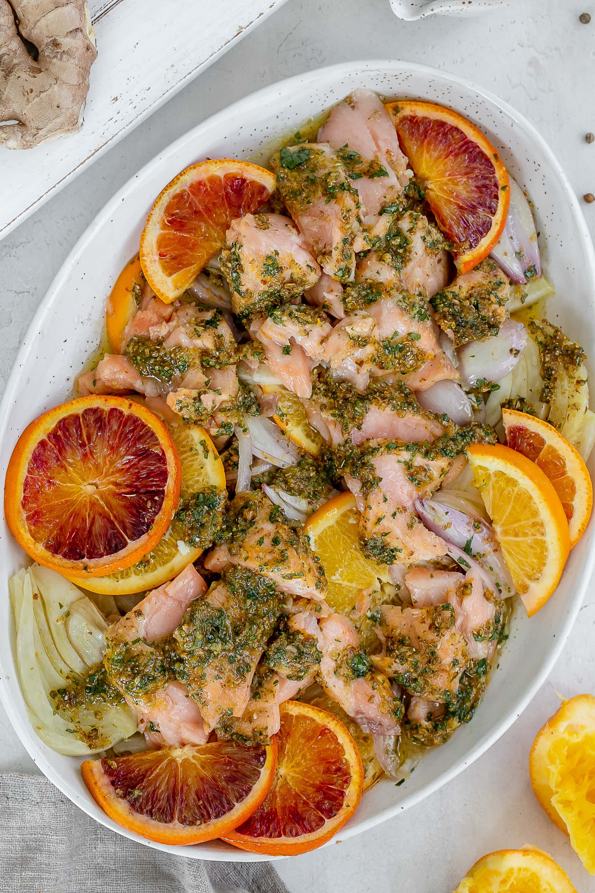 salmon with citrus on a platter with fennel.