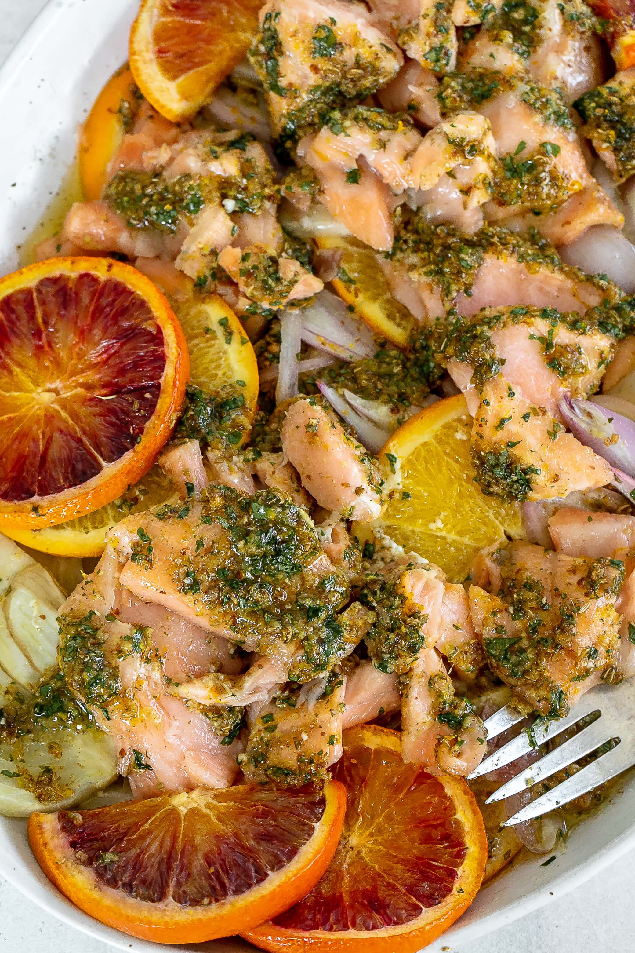 salmon with citrus on a platter with fennel.