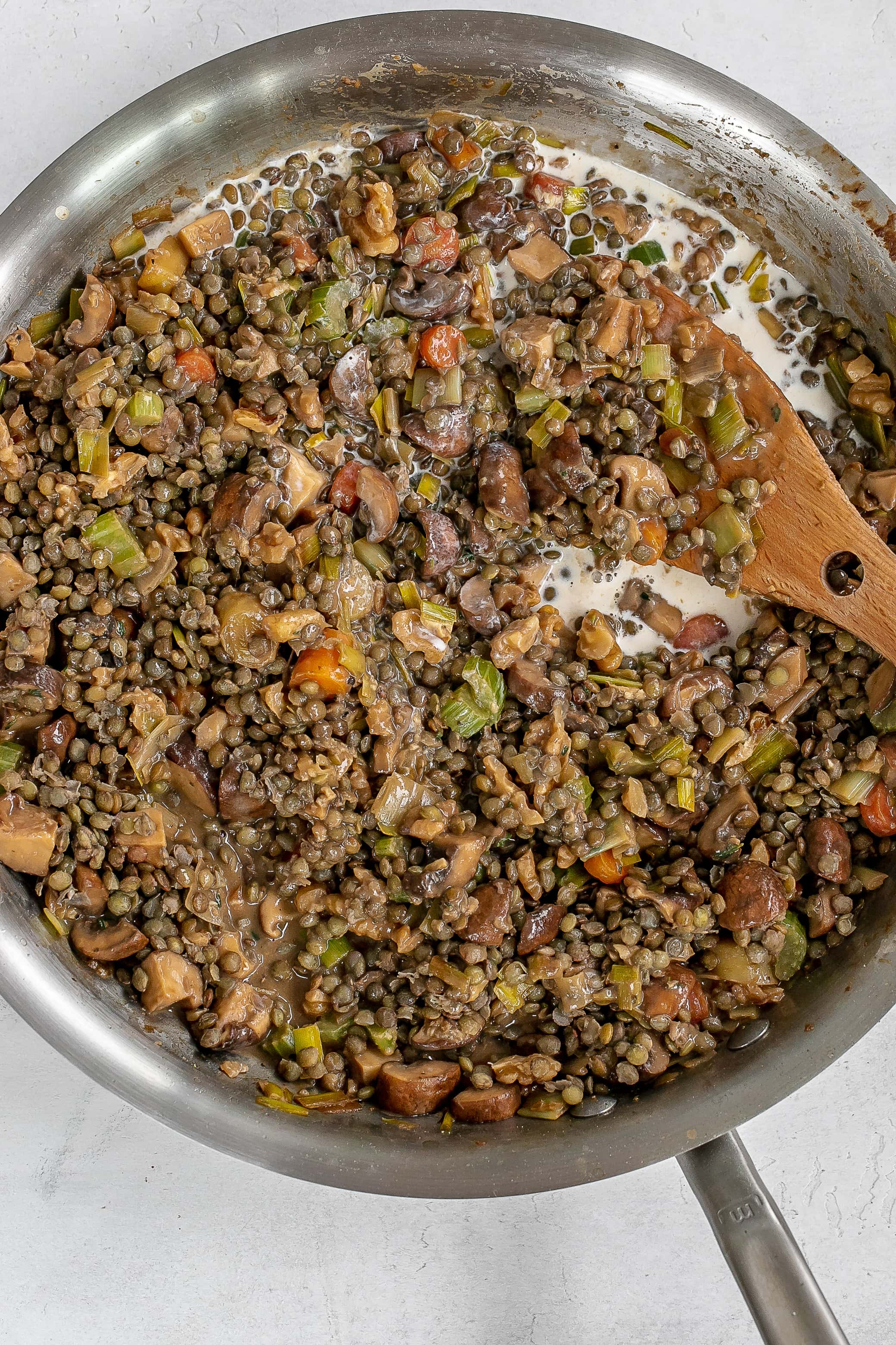 cream and lentils added to skillet. 