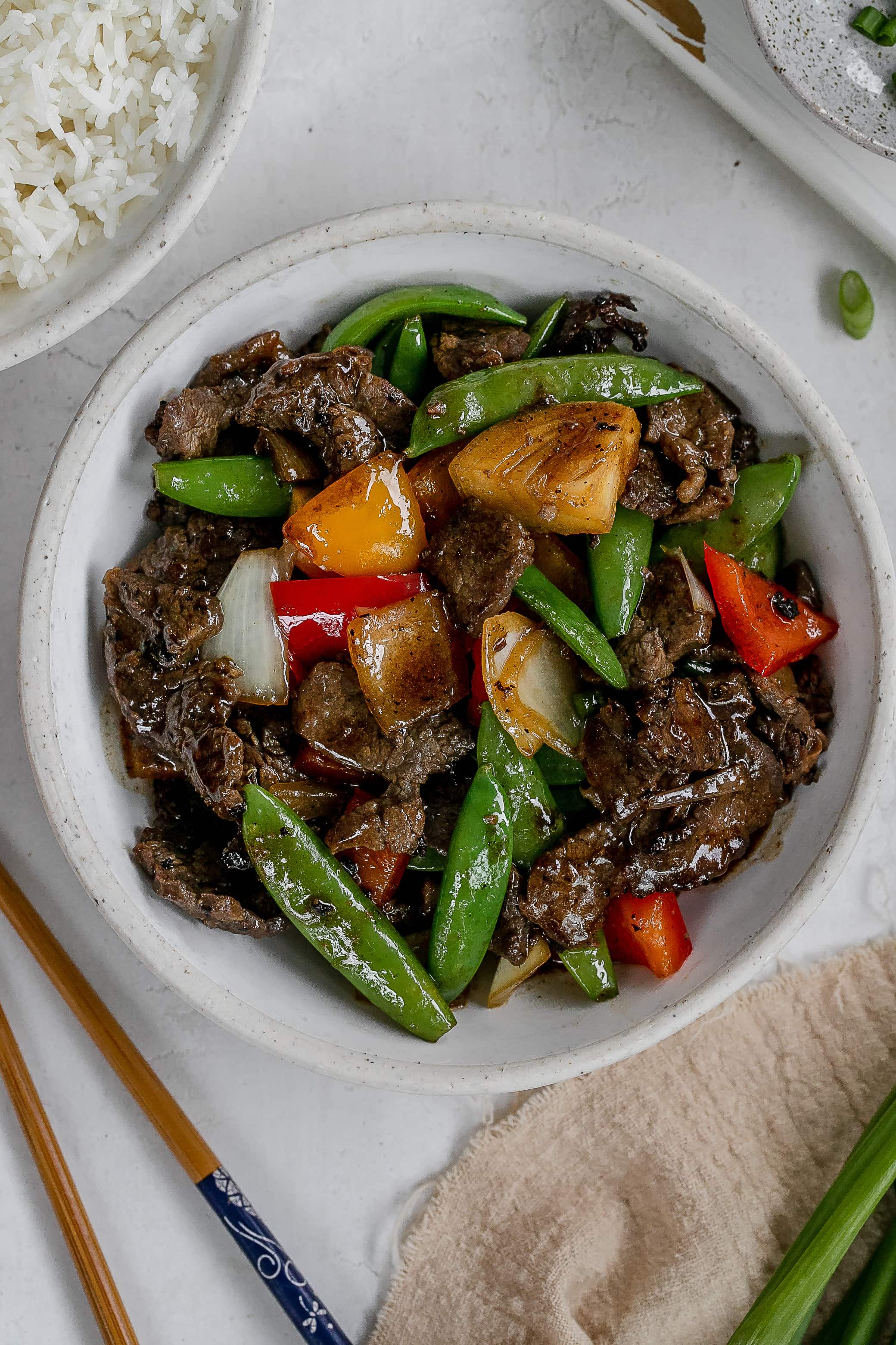 flank steak stir fry in bowl. 