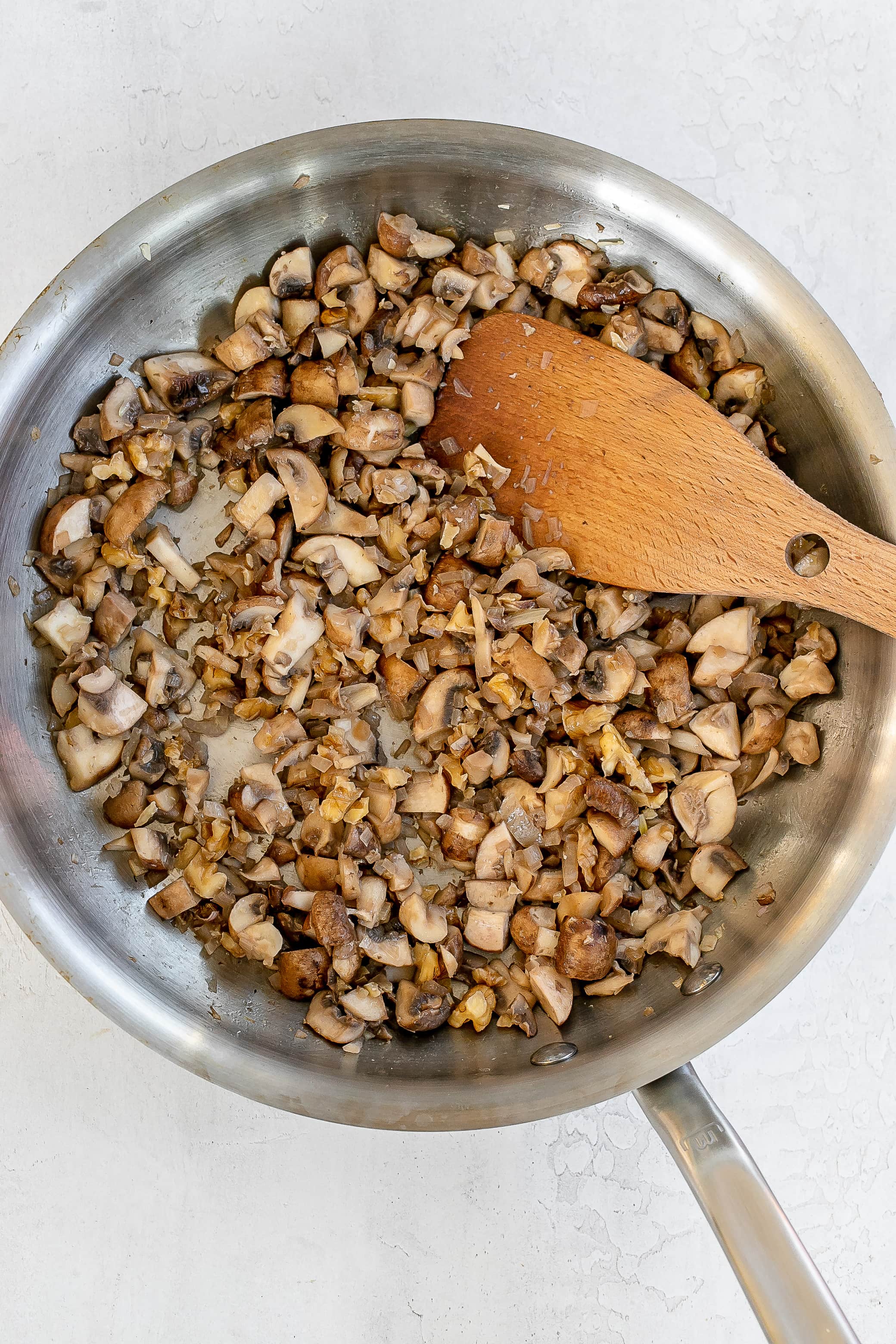 mushrooms and shallots in skillet.