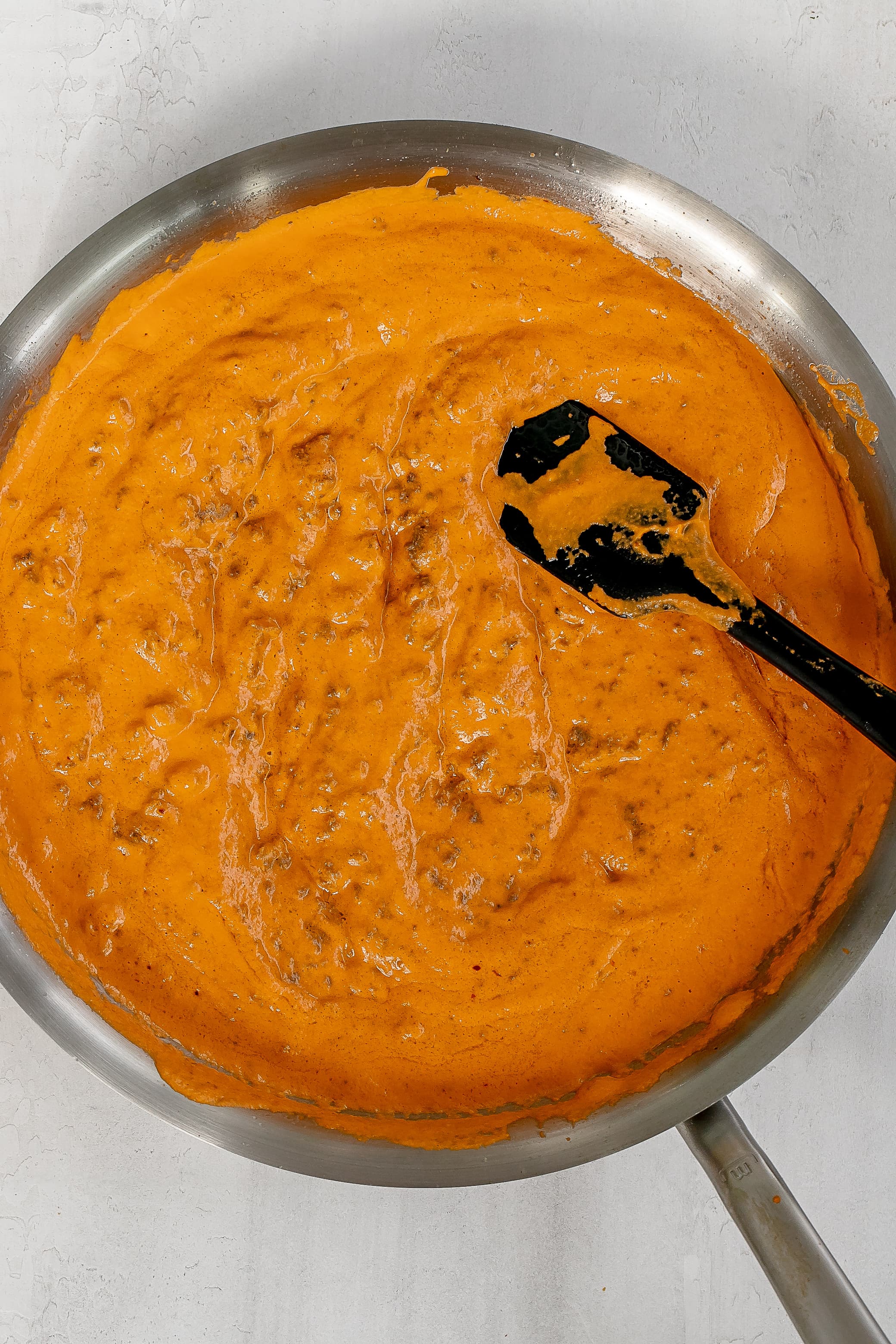 meat vodka sauce in skillet
