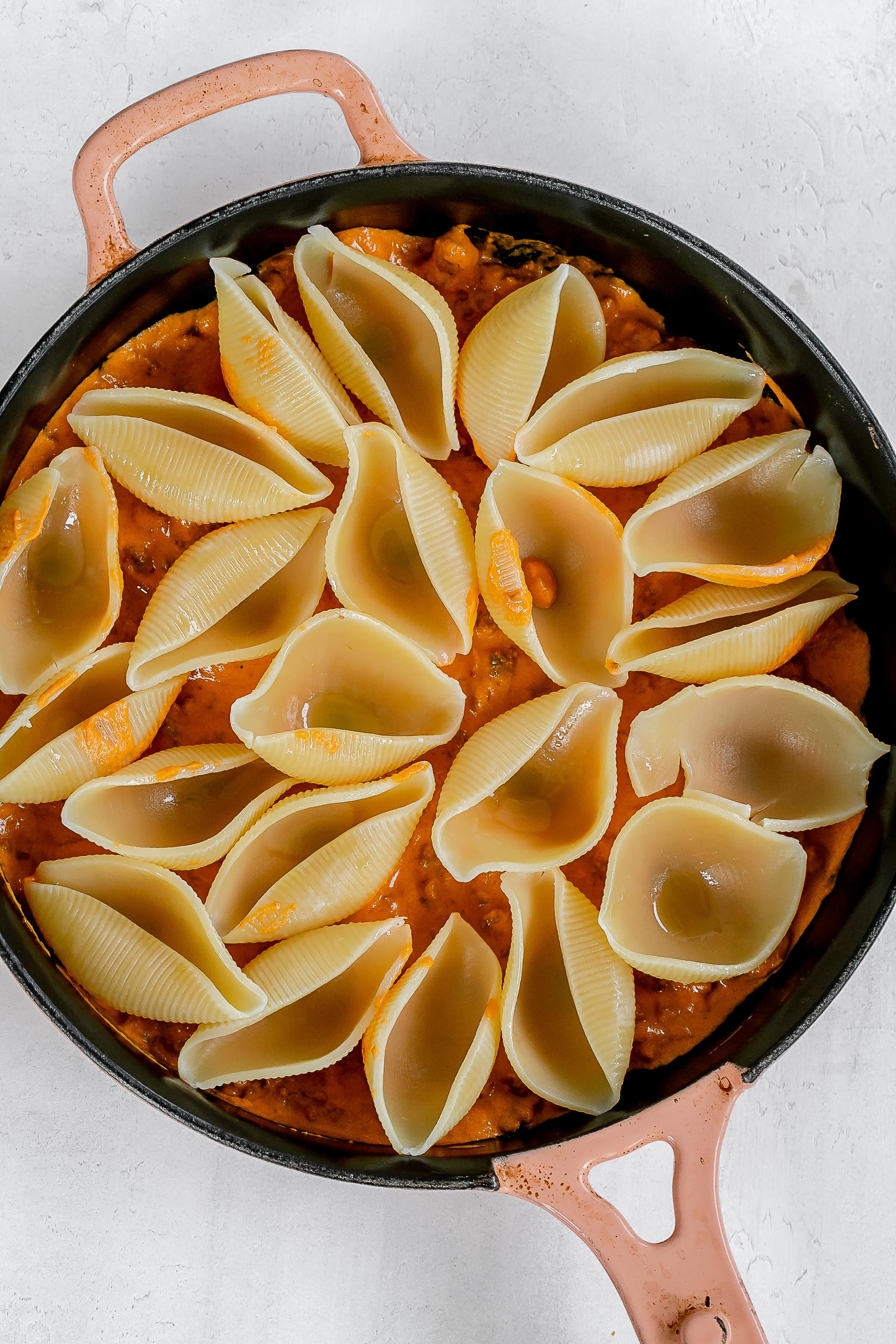 pasta shells in cast iron skillet. 