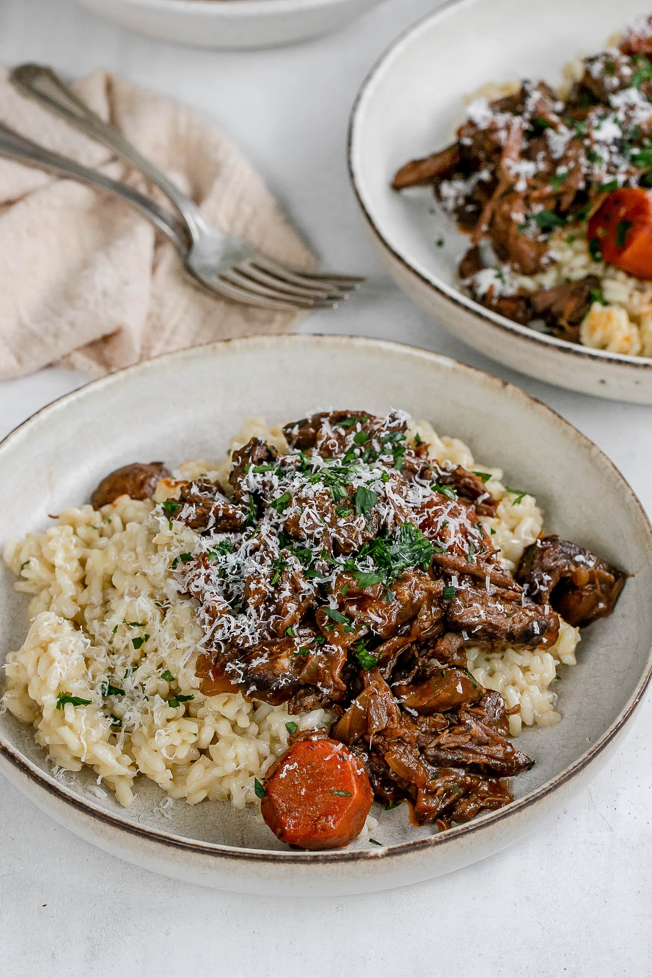 short ribs with risotto in a bowl.
