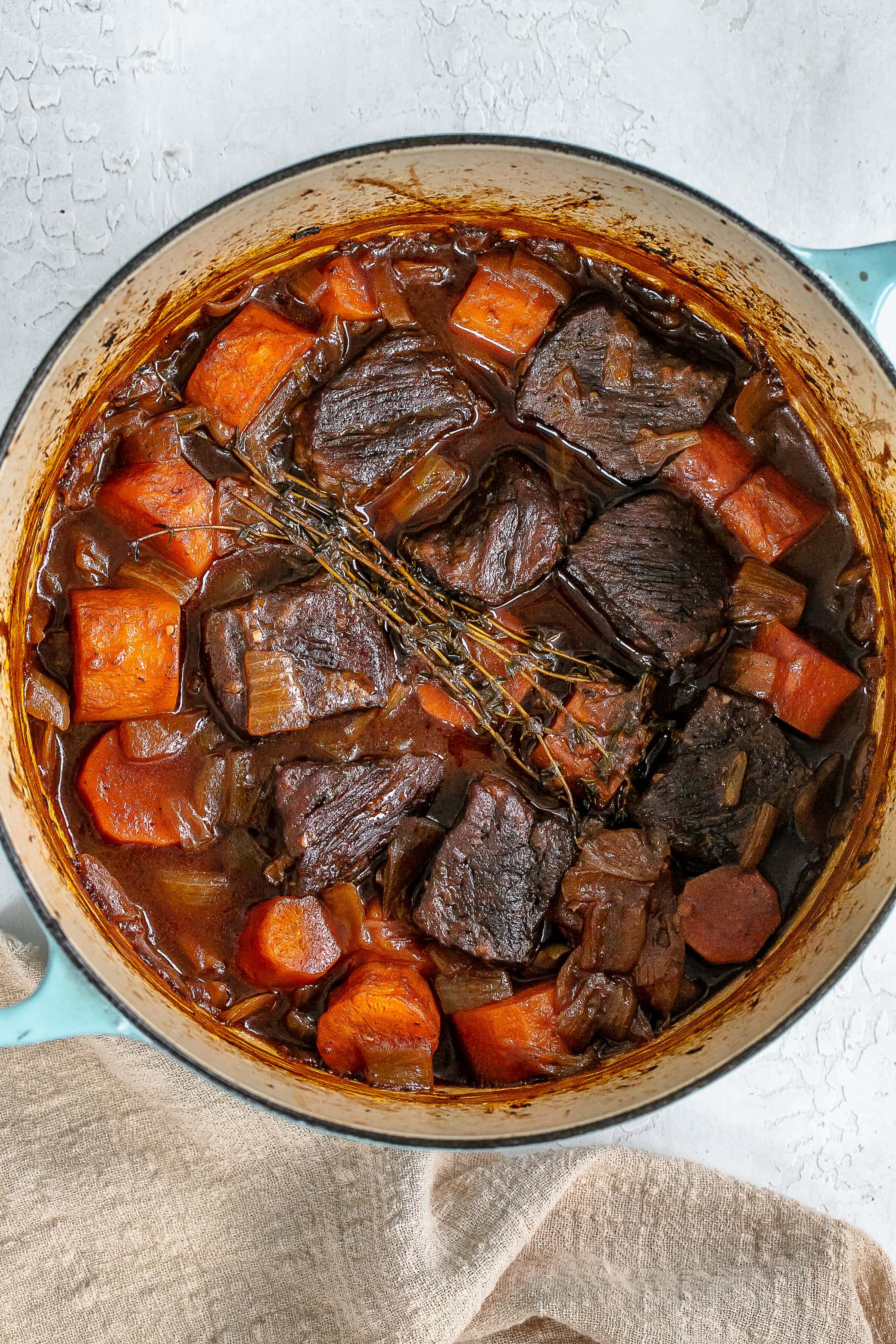 cooked braised beef in dutch oven.
