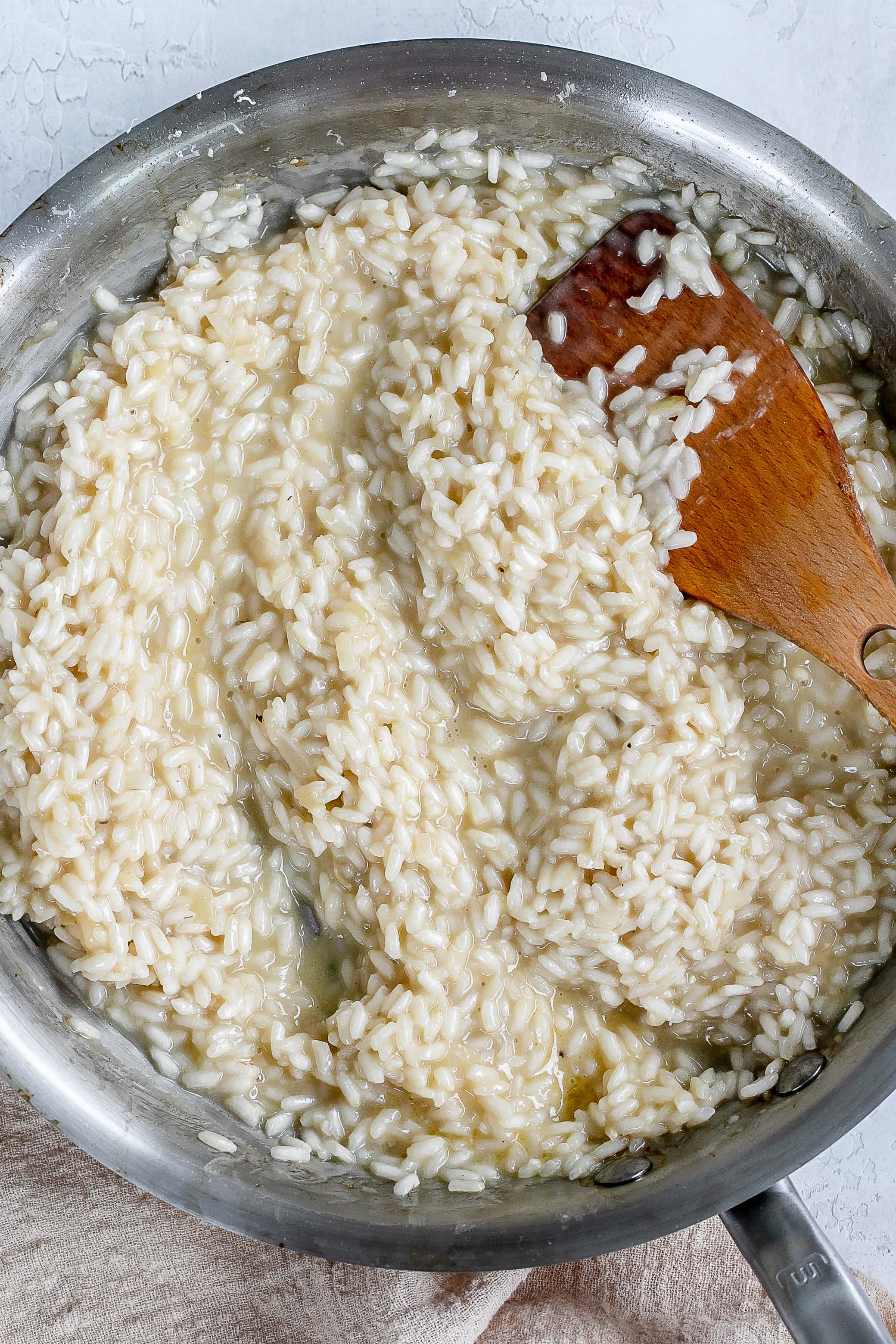 cooked risotto in skillet.
