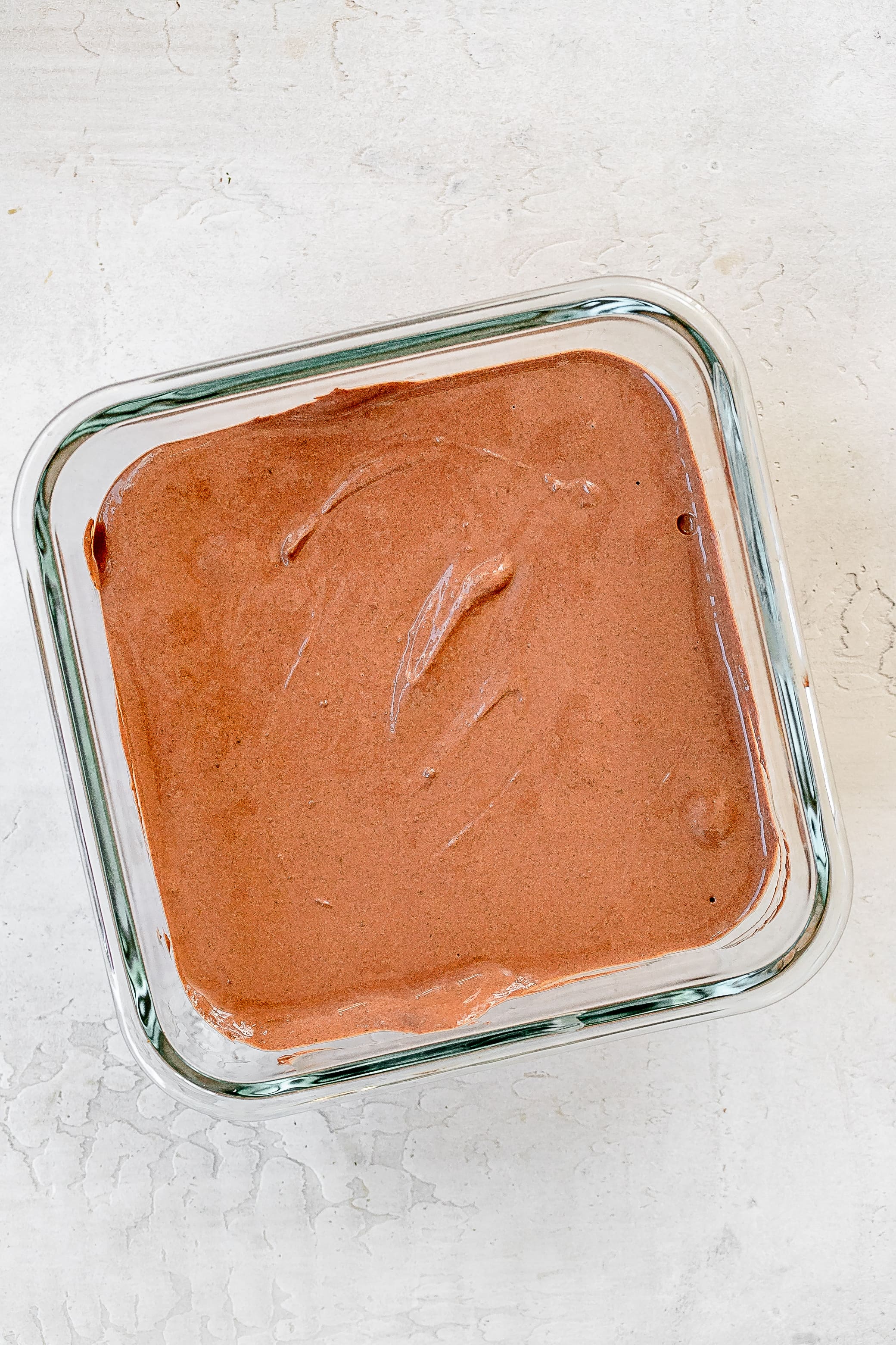 chocolate protein mousse in a container. 