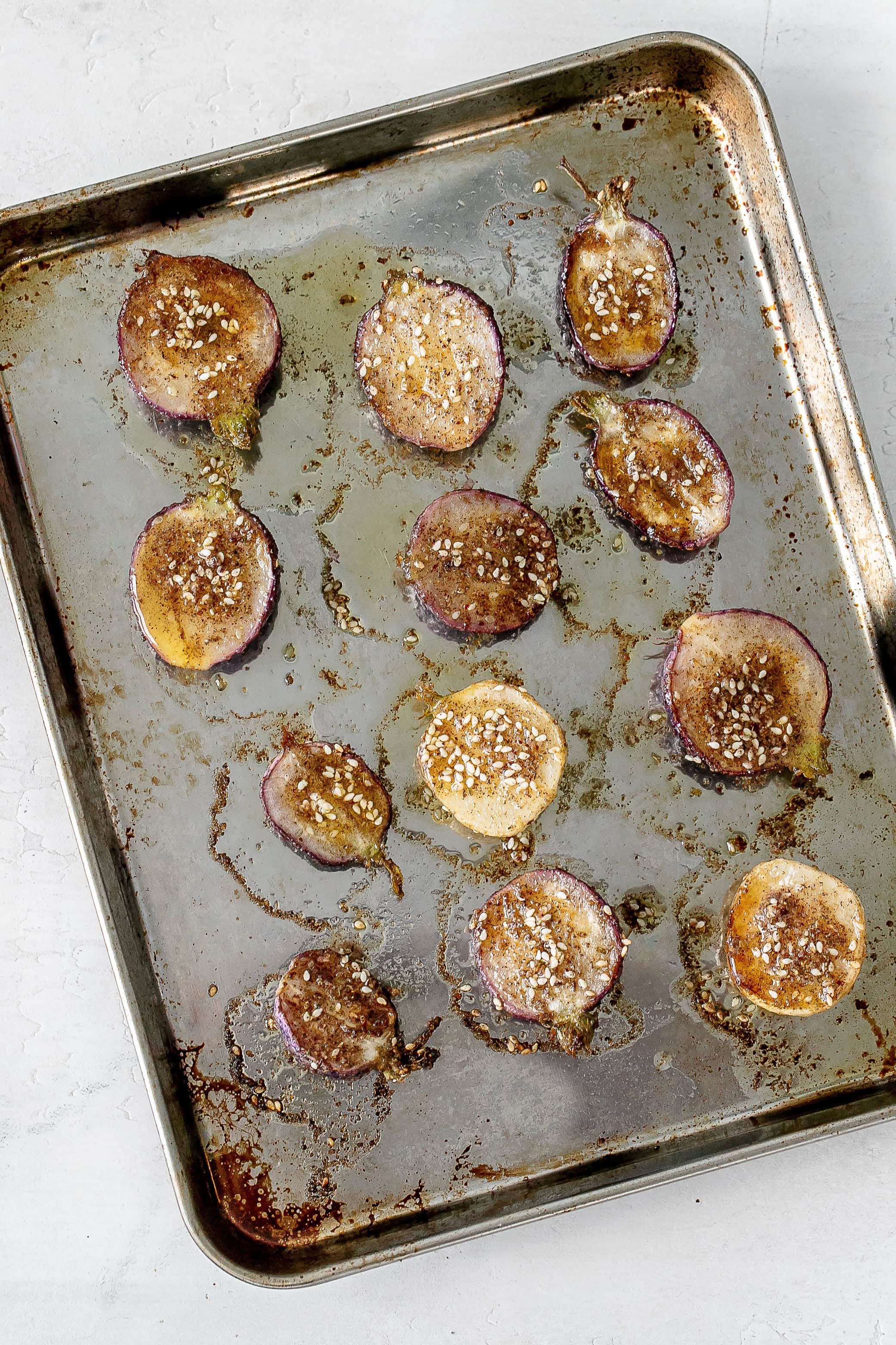 radishes flipped over on baking sheet.