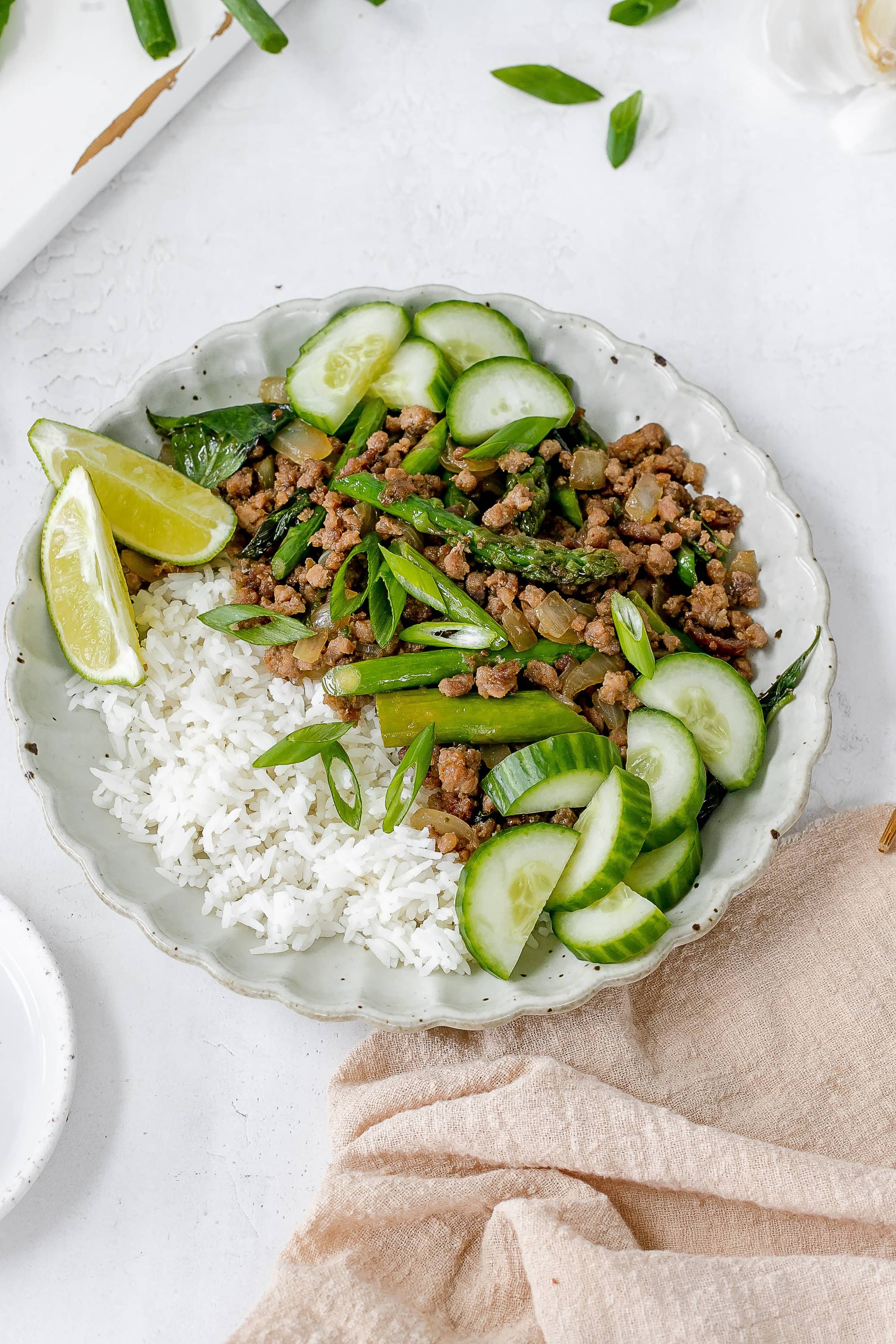 Thai ground pork stir fry on a plate.