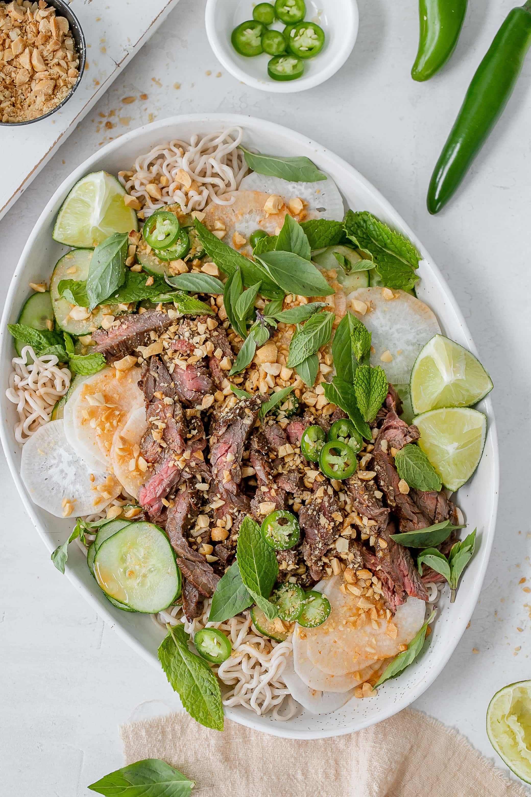Thai beef noodle salad on a platter.