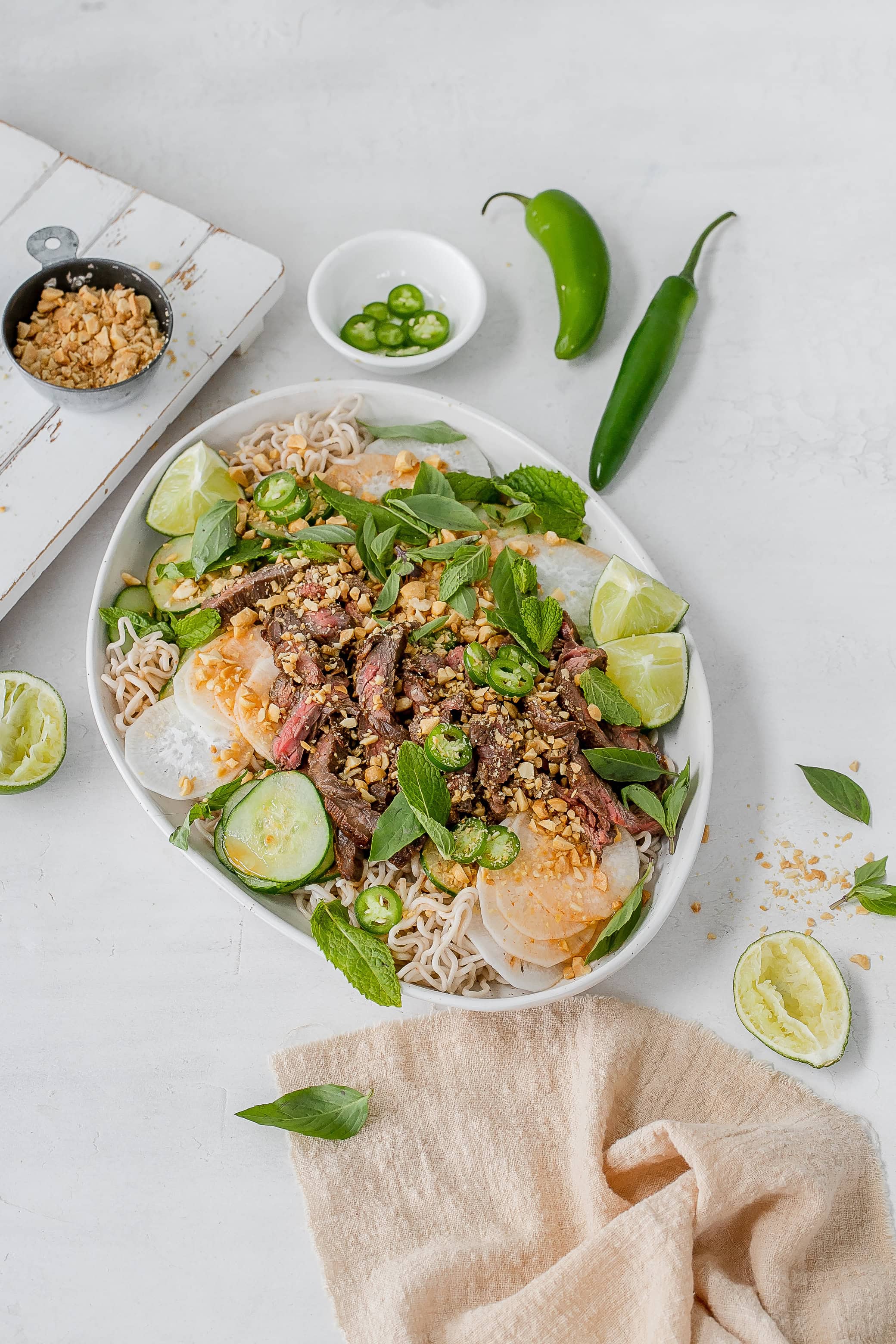 Thai beef noodle salad on a platter.