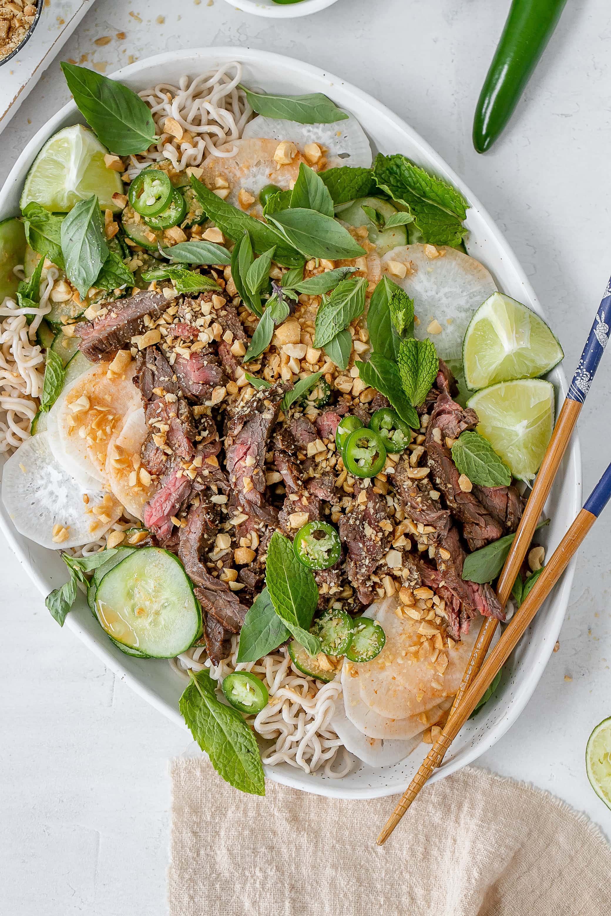 Thai beef noodle salad on a platter.