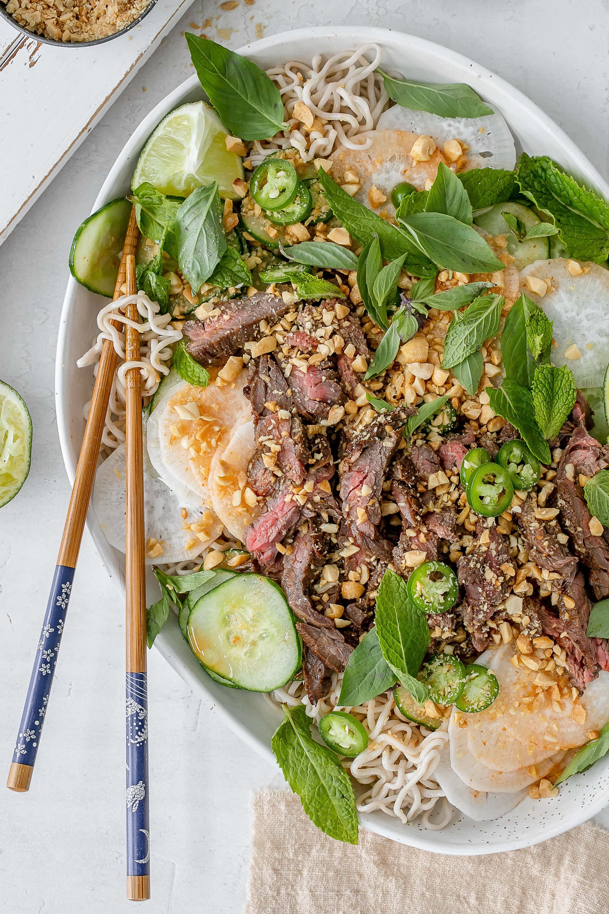 Thai beef noodle salad on a platter.