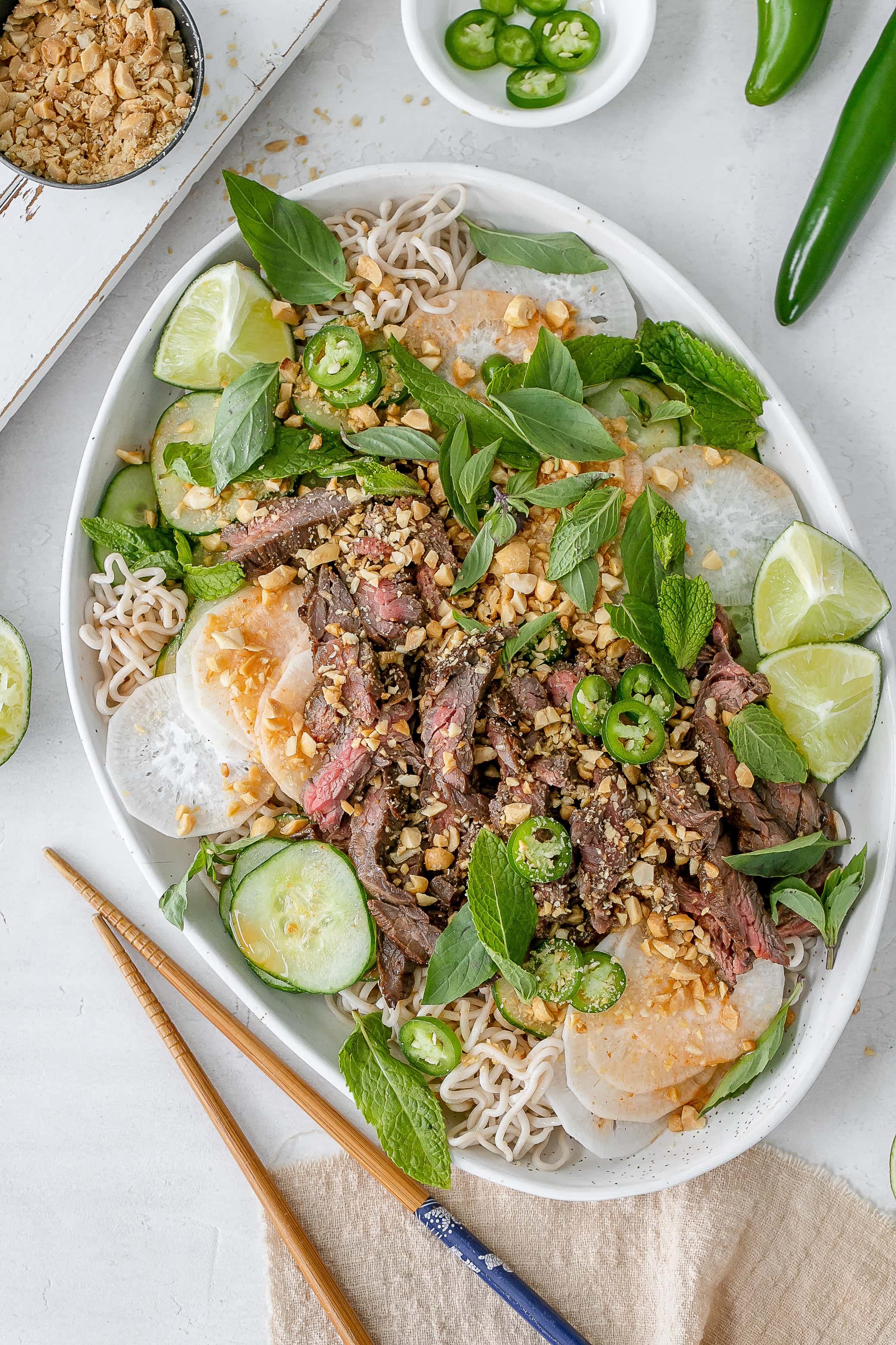 Thai beef noodle salad on a platter.