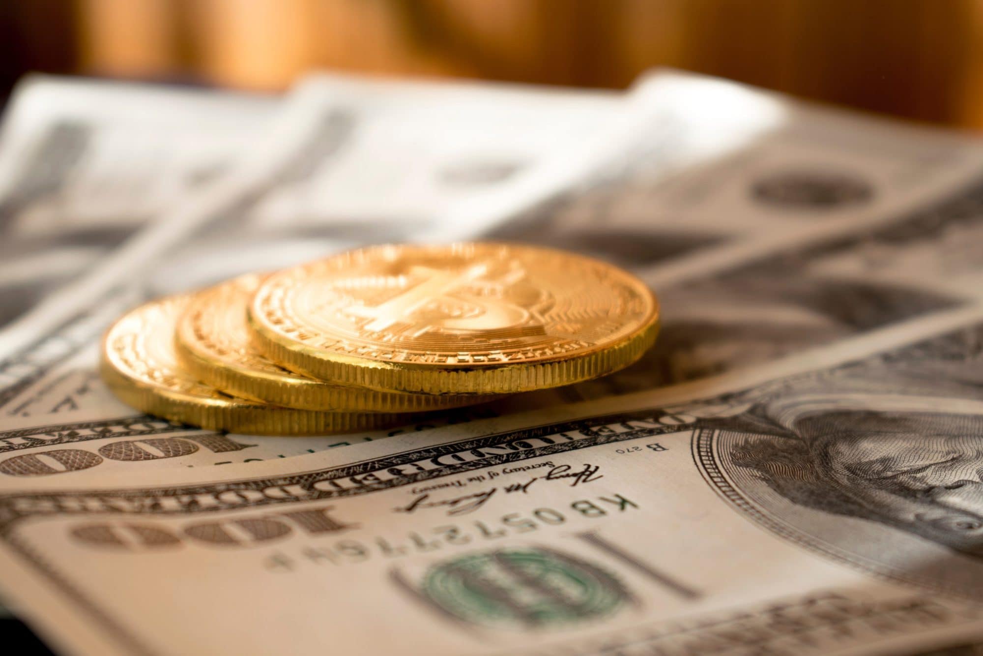 Dollar notes and three coins.