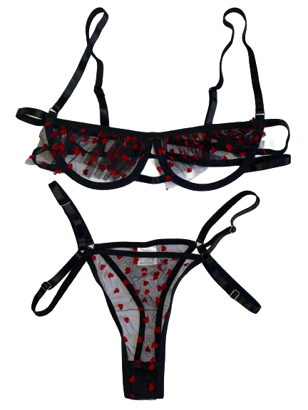 a black mesh lingerie set with red hearts