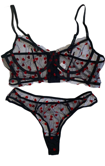 a black mesh lingerie set with red hearts