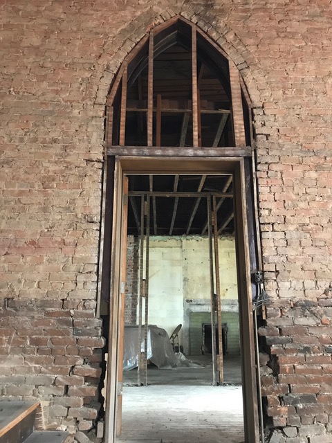 Gothic window discovered behind the wall