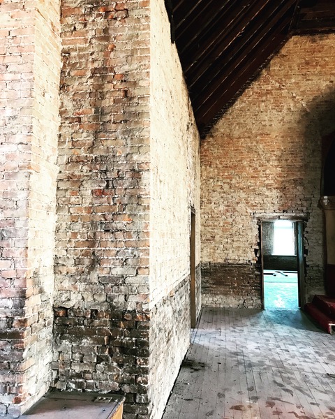 Raw brick in Adelaide Hall