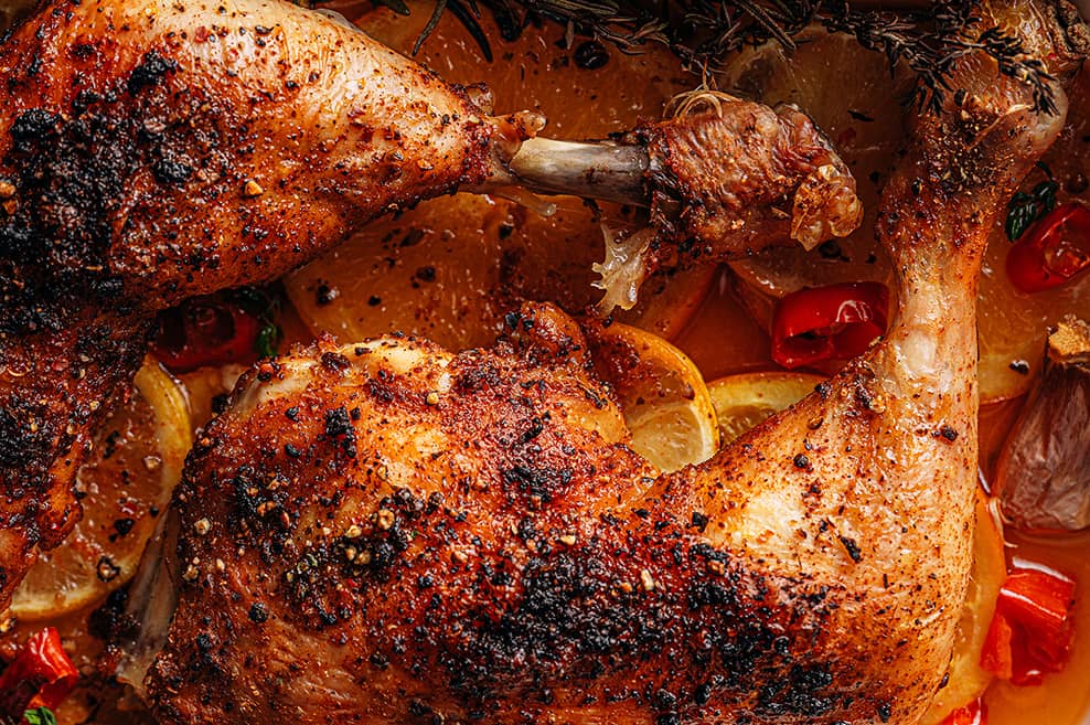 Chicken legs roasted in pepper, paprika, lemon, and chillies.