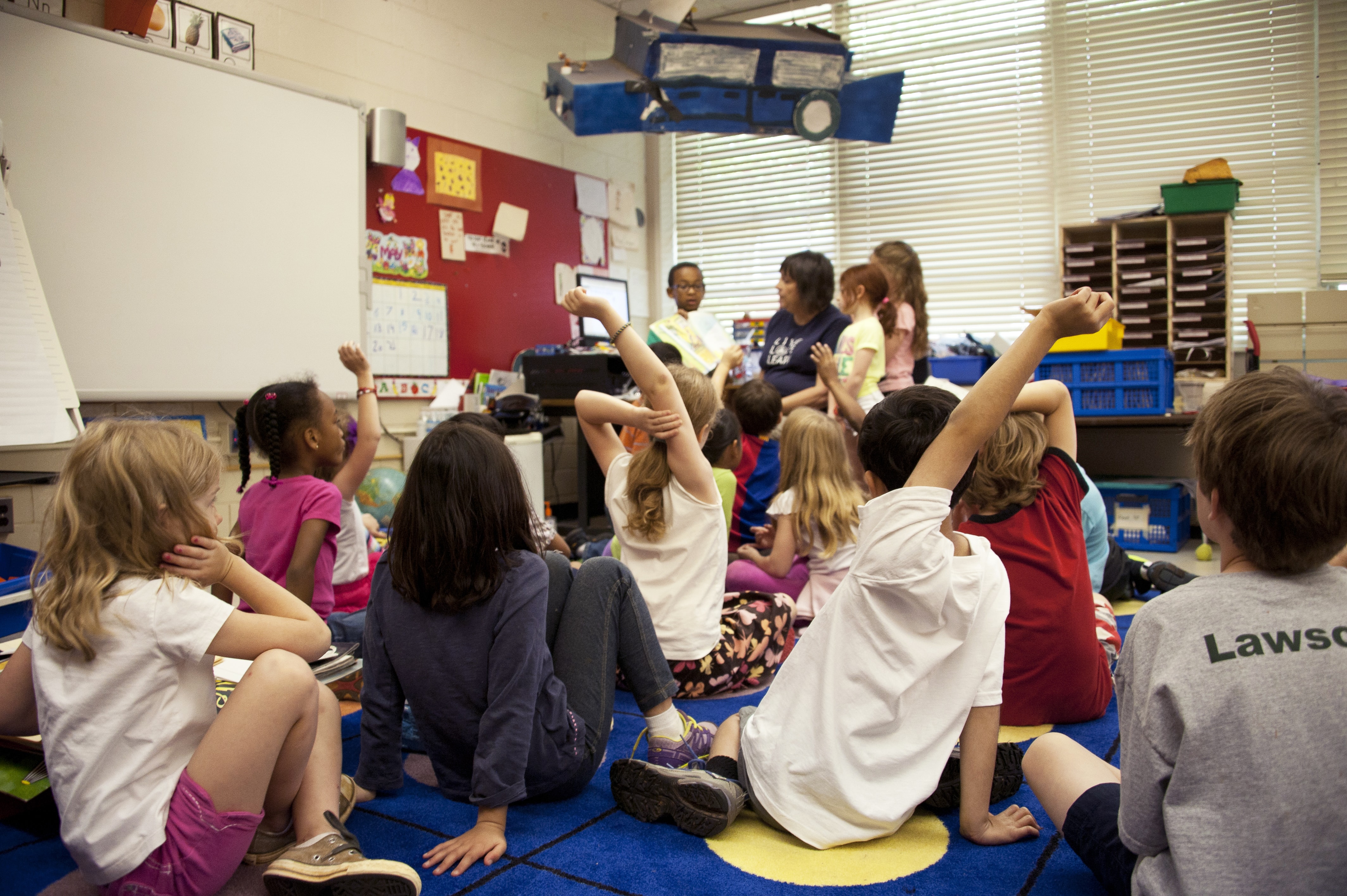 children participating in class