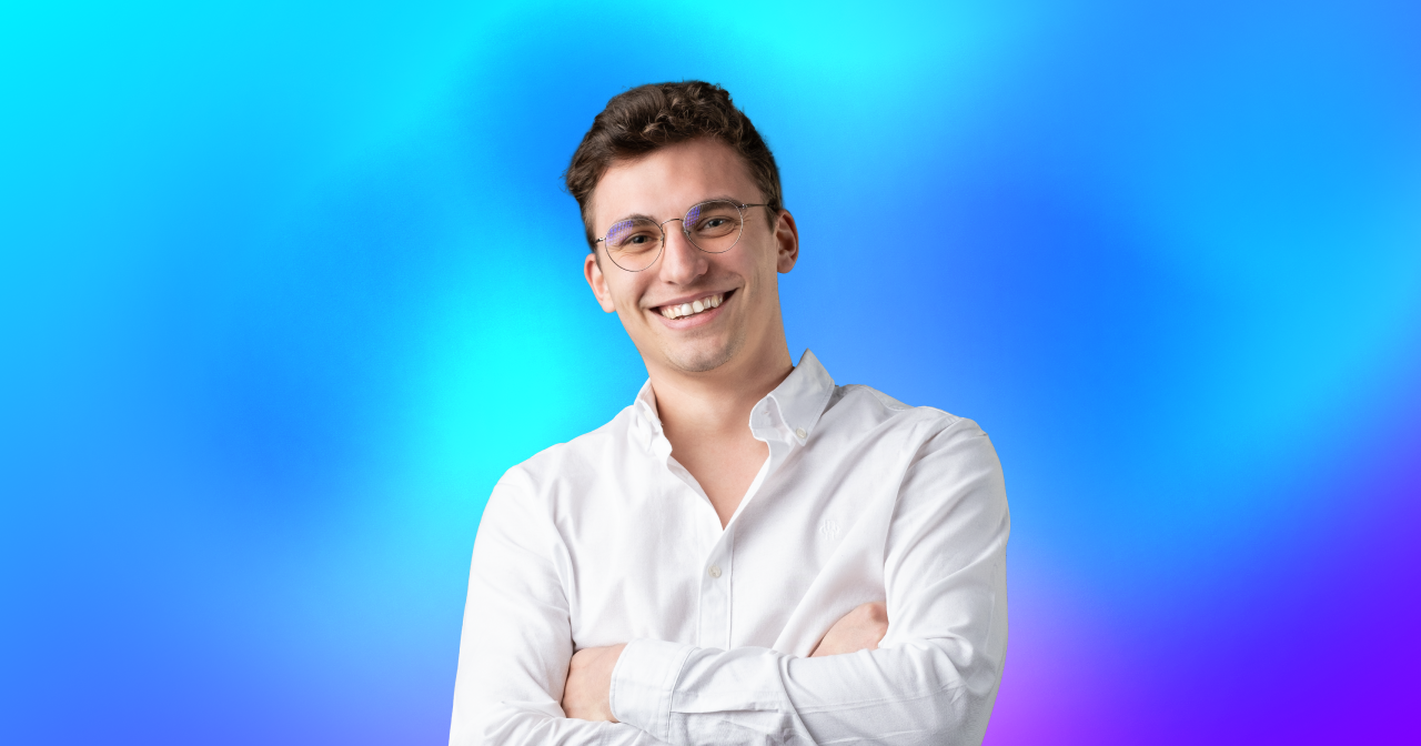 a picture of a smiling profesional guy in a white shirt