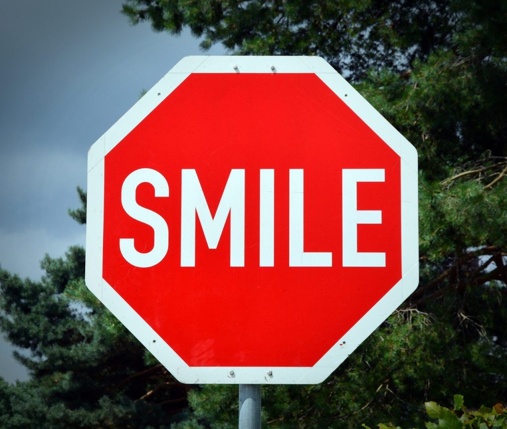 Smile, when you are welcoming/greeting your guests