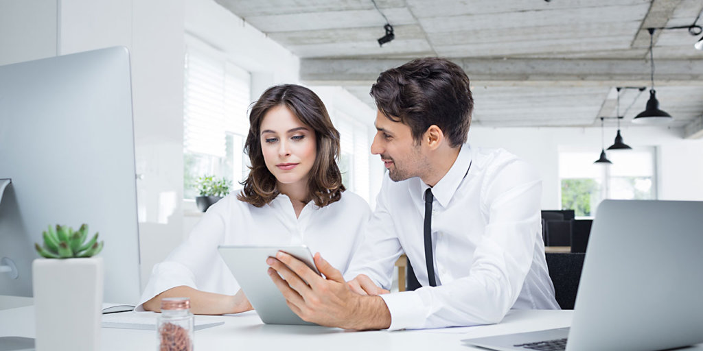 Two business partners working together in office