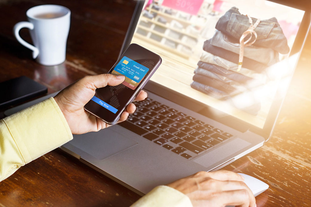 Man using smartphone shopping online