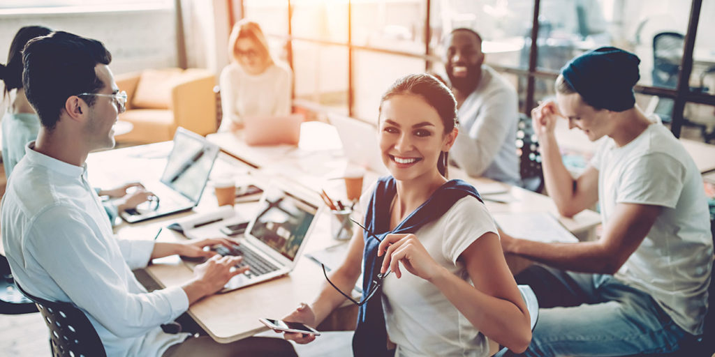 Successful freelancer team in coworking in modern office