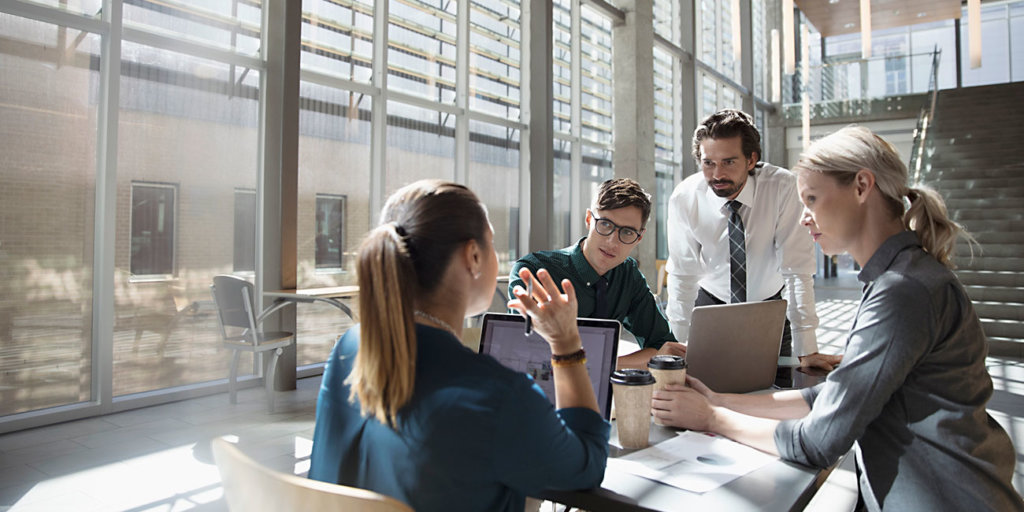 effective business communication, photo of people talking, working at office