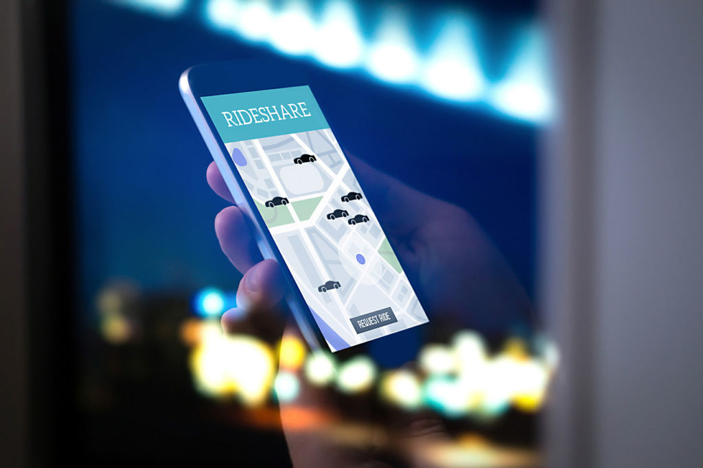 Rideshare mobile app on smartphone screen.