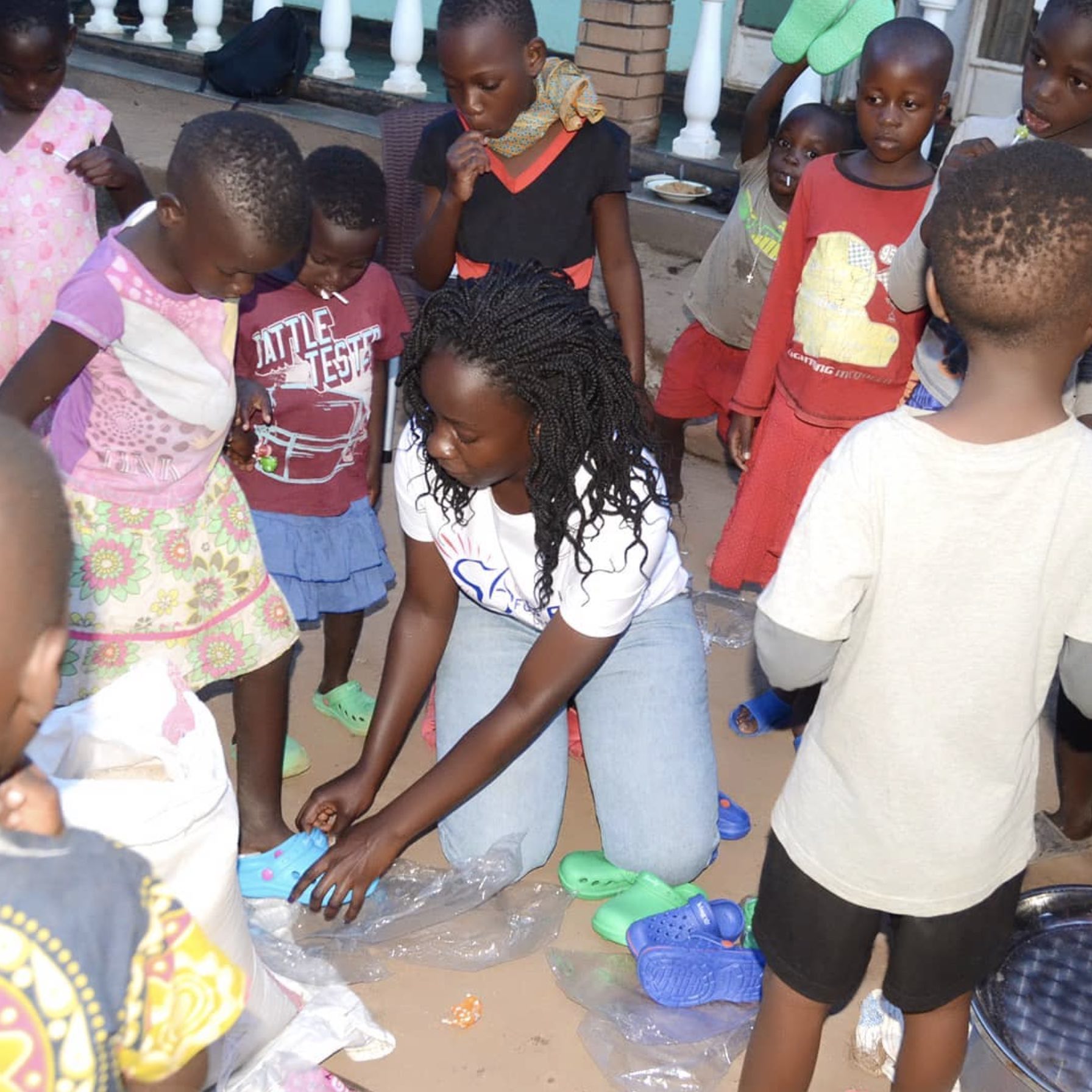 Mukoota Primrose helps some of the children at Amber Foundation