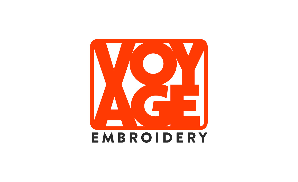 Logo of voyage embroidery in a rounded bob