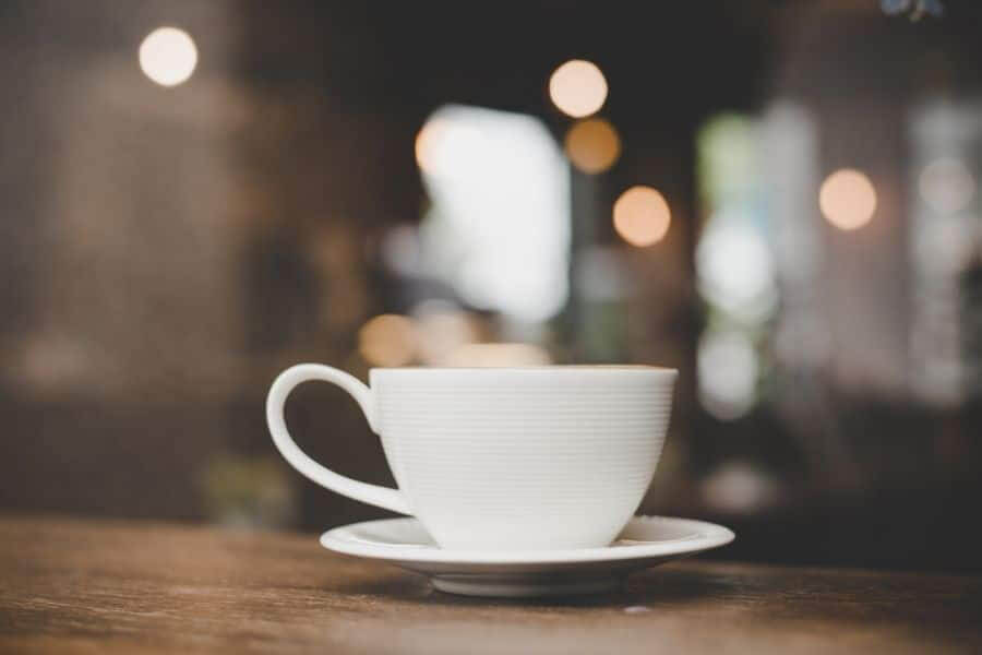 Cup of tea sitting on table in cafe