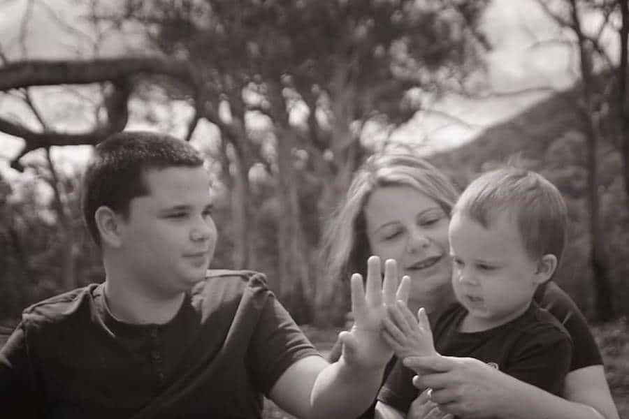 Two boys with autism and their mum