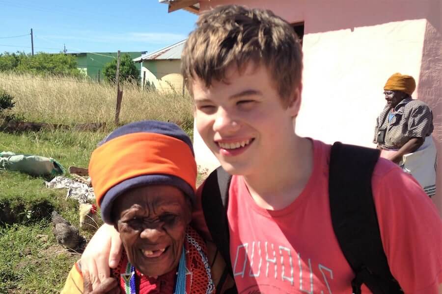 Sam best with an African elder in africa