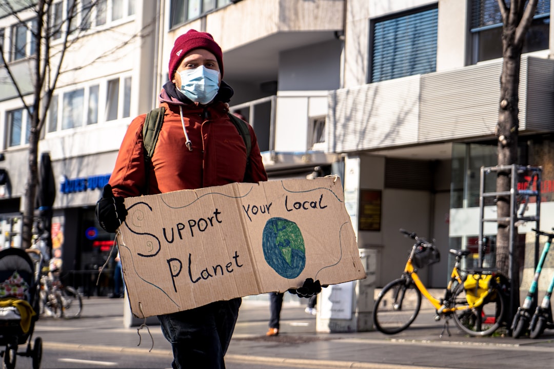 support your local planet on cardboard signage