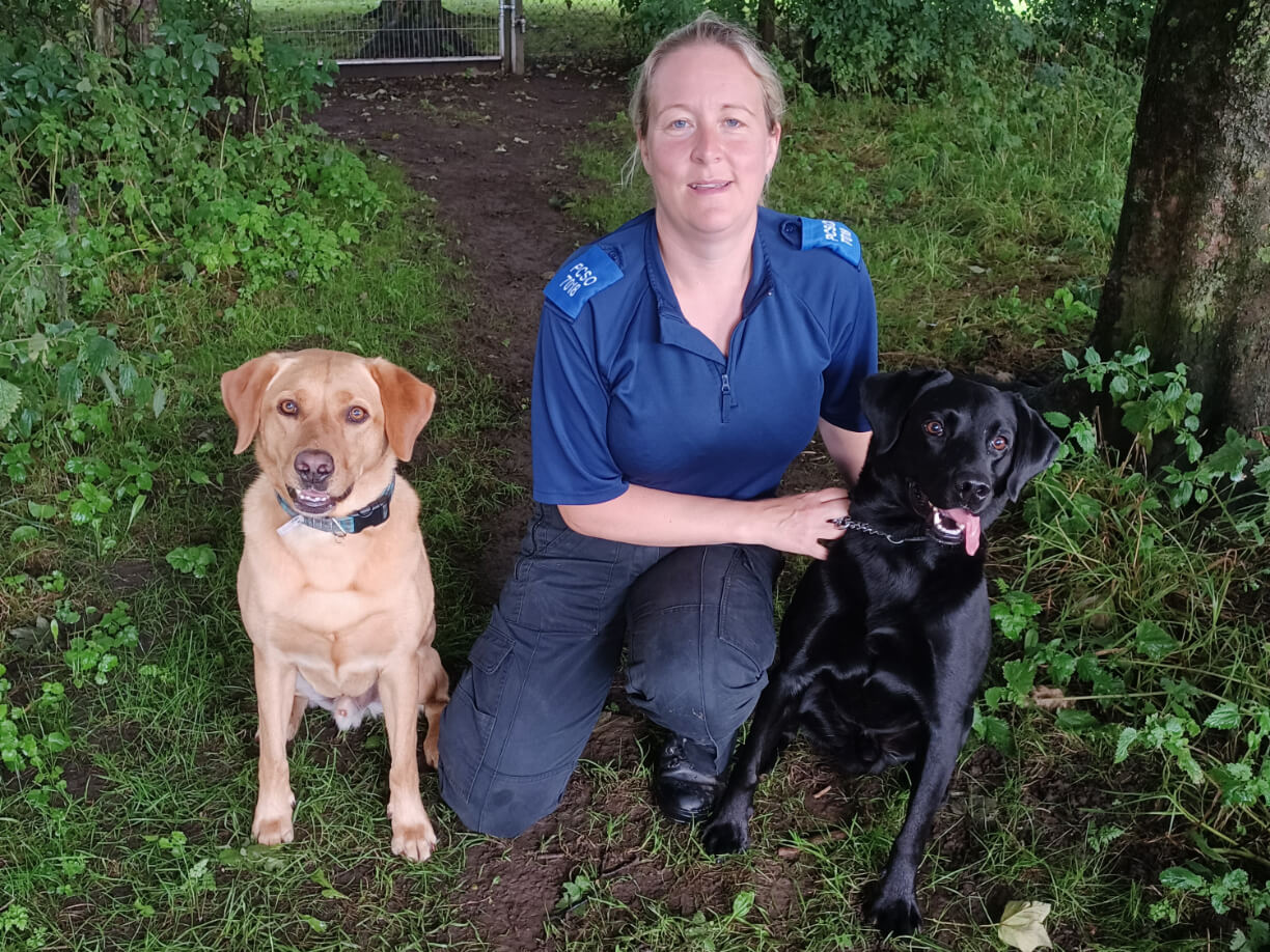 Claire, jet and Ben in the woods