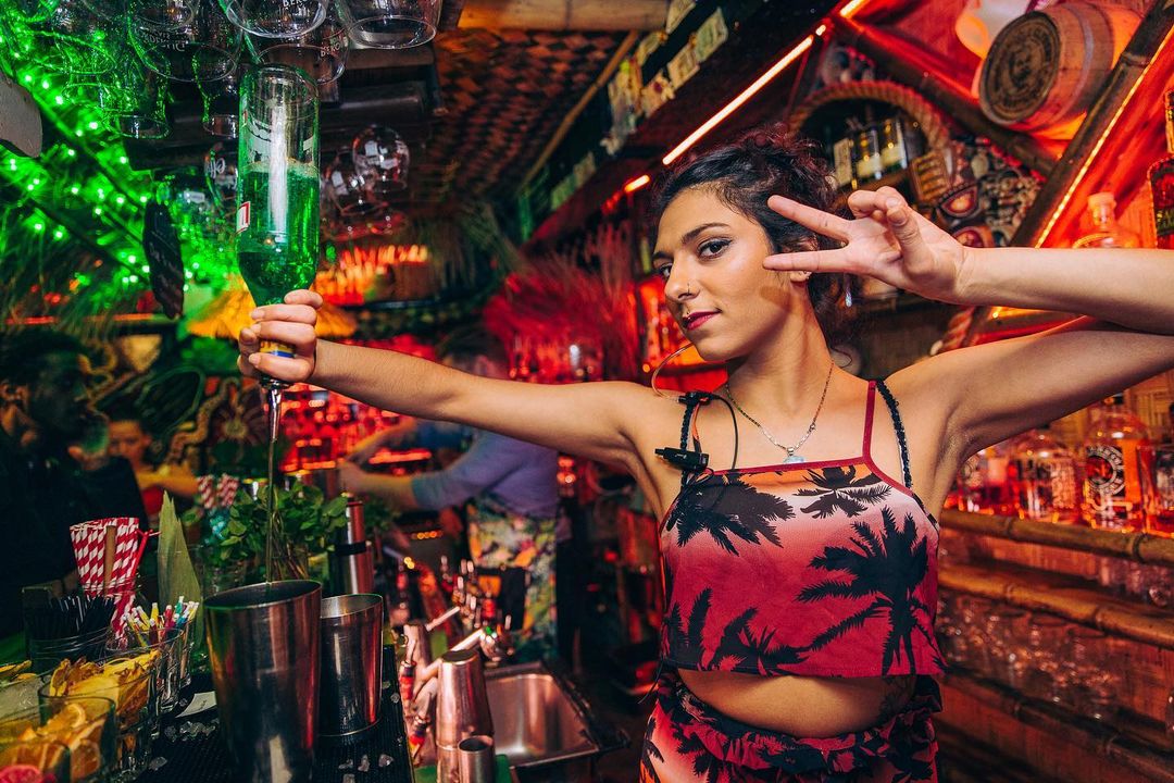 Beachcomber bartender making a drink