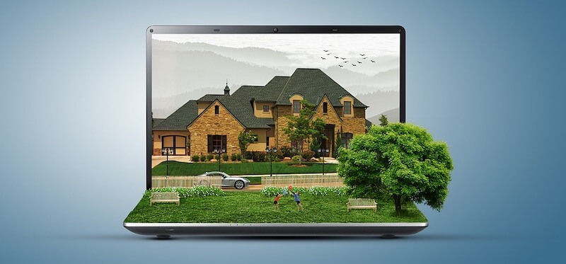 Image of a house on a laptop screen.