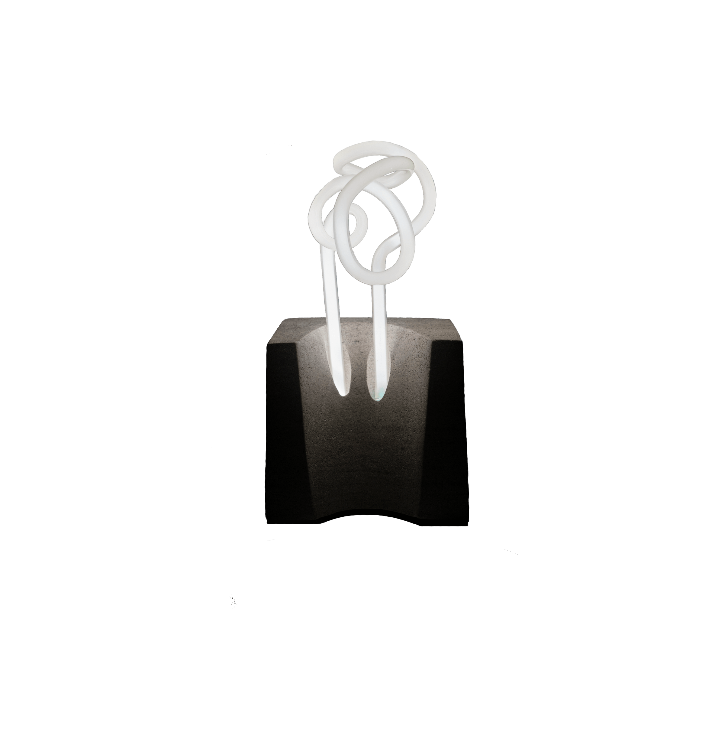 A squiggle of white neon bulb floats above a concave limestone base