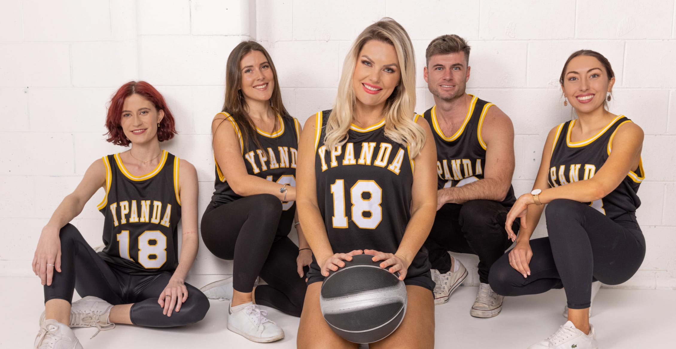The Yellowpanda team dressed in basketball gear