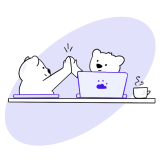 A bear giving a high-five to another bear.