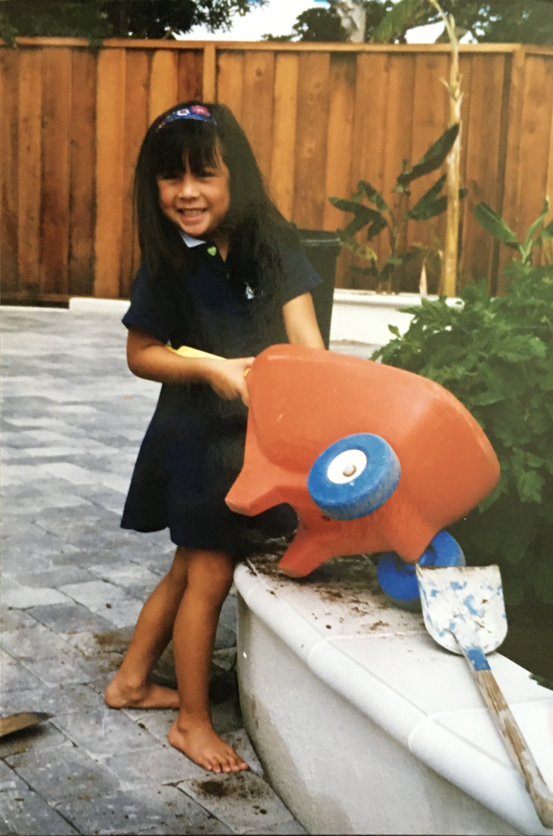 Little me, with wheelbarrow.