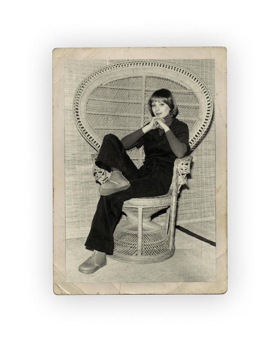 photo of woman in chair