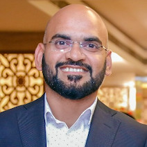 Profile picture of man wearing a suit