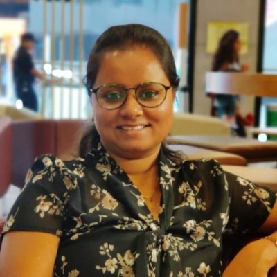 Profile picture of female in an office