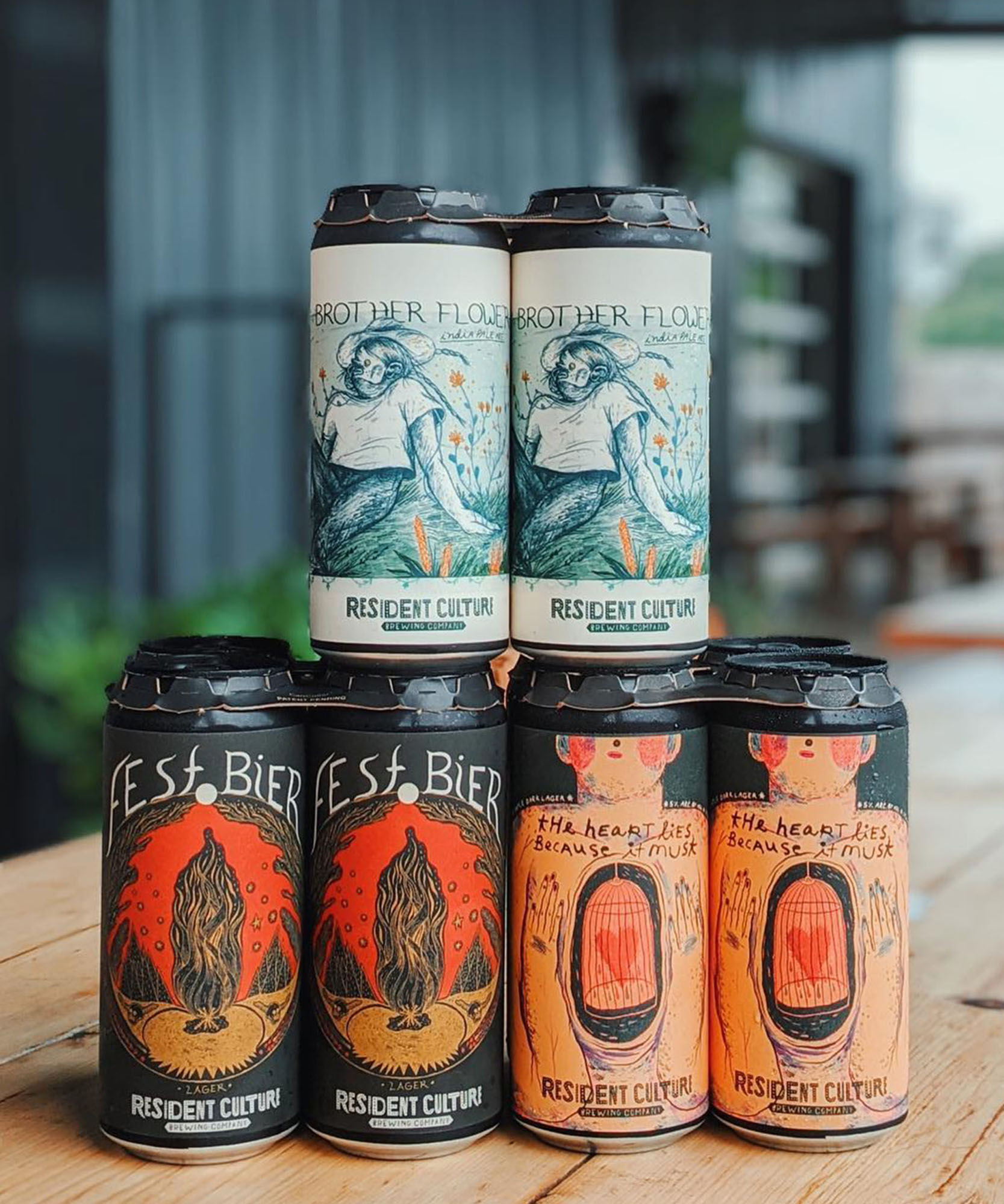 a photo of canned beverage drinks with colorful illustrations