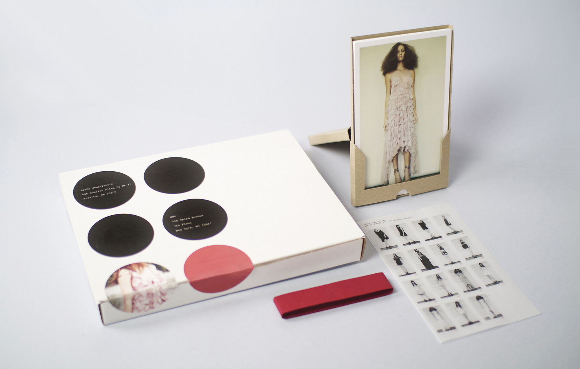 a photo of a model wearing a pink dress and a white box with a white background